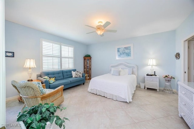 bedroom featuring light tile patterned floors and ceiling fan