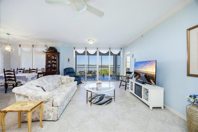 living room with ceiling fan and crown molding