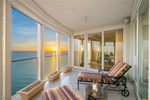 sunroom with a water view