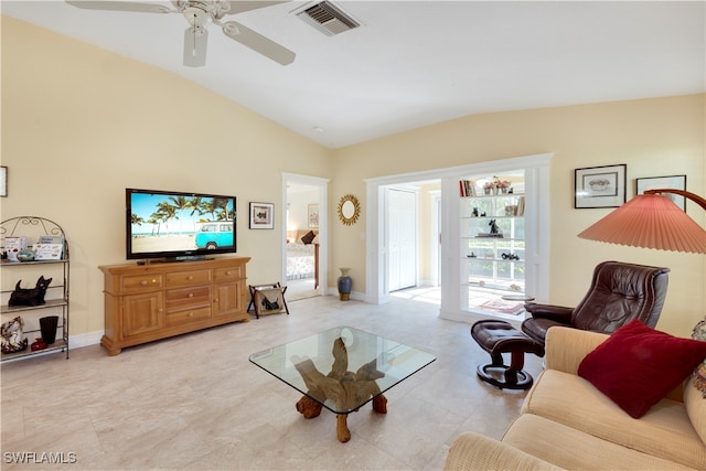 living room with ceiling fan and vaulted ceiling