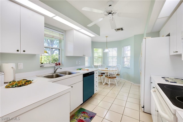 kitchen featuring white cabinets, dishwasher, and hanging light fixtures