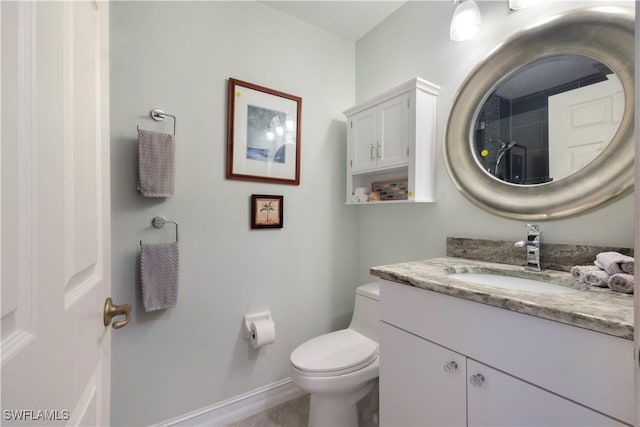 2050 Palo Duro Blvd, North Fort Myers, FL 33917 - bathroom featuring vanity, toilet, and baseboards