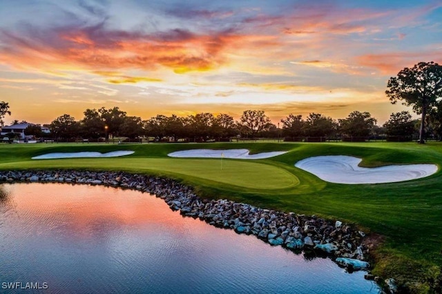 2050 Palo Duro Blvd, North Fort Myers, FL 33917 - view of home's community with golf course view, a putting green, and a water view