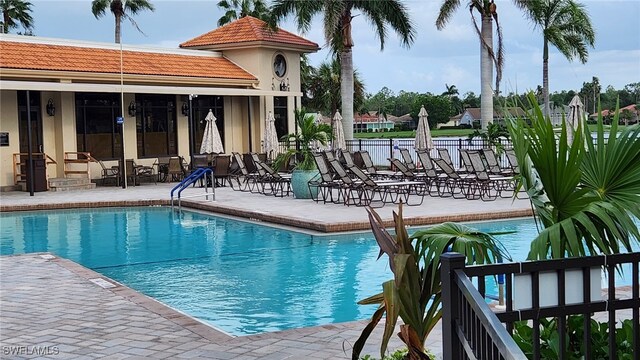 2050 Palo Duro Blvd, North Fort Myers, FL 33917 - community pool with a patio area