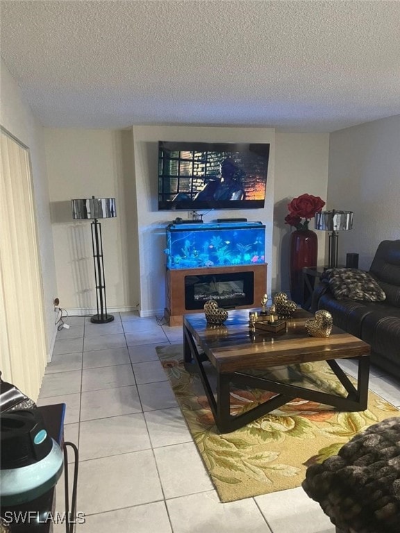 tiled living room with a textured ceiling