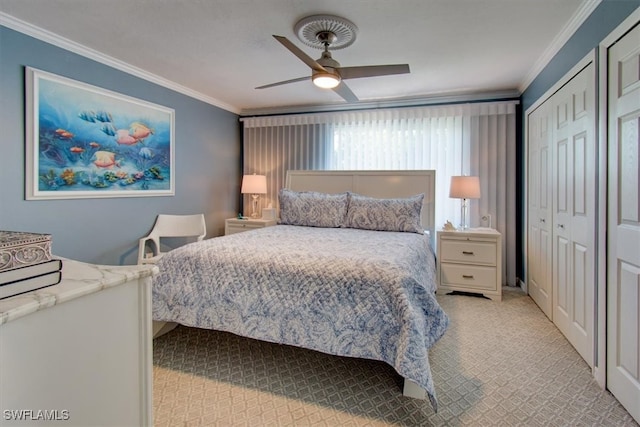 bedroom with ornamental molding and ceiling fan