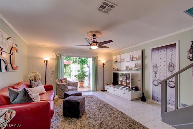 tiled living room featuring ceiling fan and ornamental molding