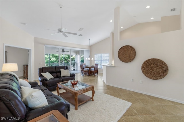 living room with light tile patterned flooring, ceiling fan, and high vaulted ceiling