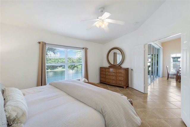 tiled bedroom with ceiling fan