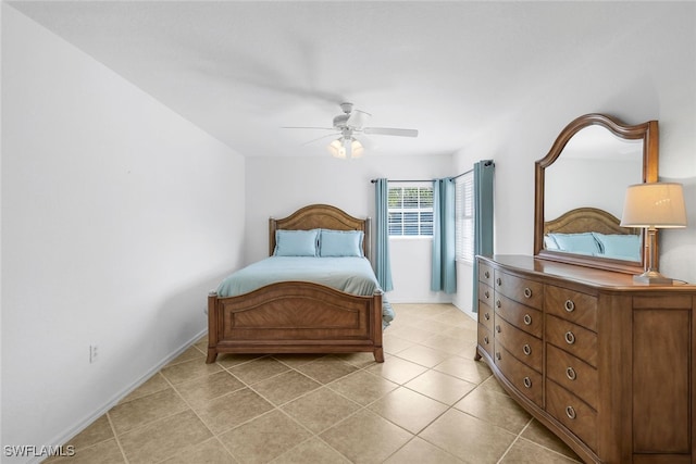 bedroom featuring ceiling fan and light tile patterned flooring