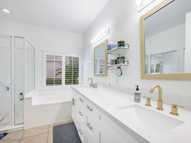 bathroom featuring tile patterned floors, vanity, and separate shower and tub