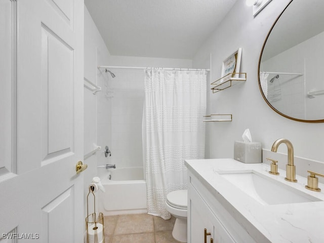 full bathroom featuring tile patterned flooring, vanity, shower / bath combo, and toilet