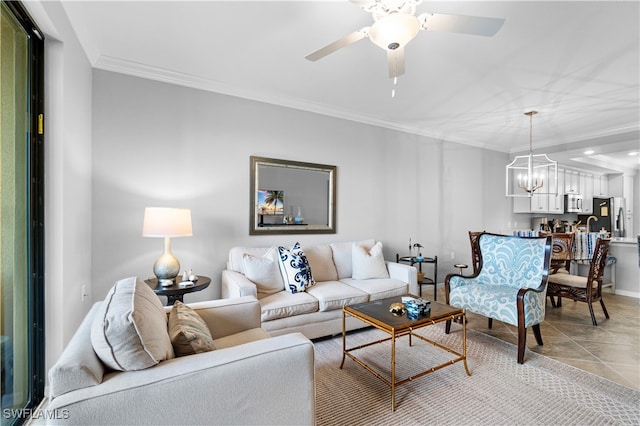 tiled living room featuring ceiling fan with notable chandelier and ornamental molding