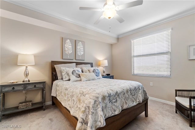 bedroom with ceiling fan, ornamental molding, and light colored carpet