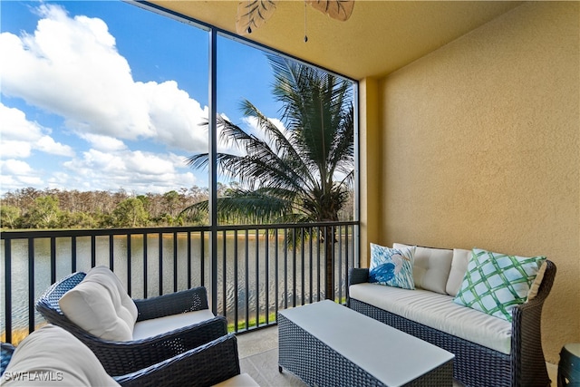 sunroom with a water view