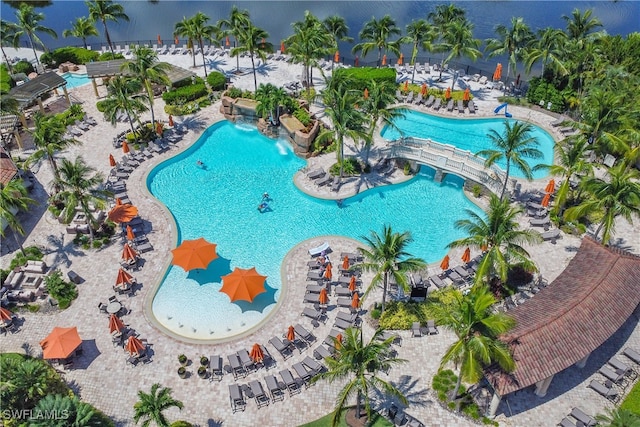 birds eye view of property featuring a water view