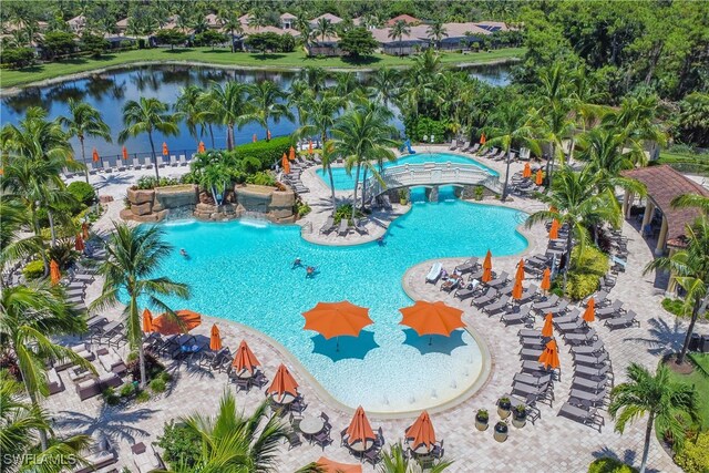 view of pool featuring a water view