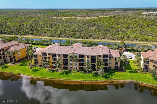 drone / aerial view with a water view