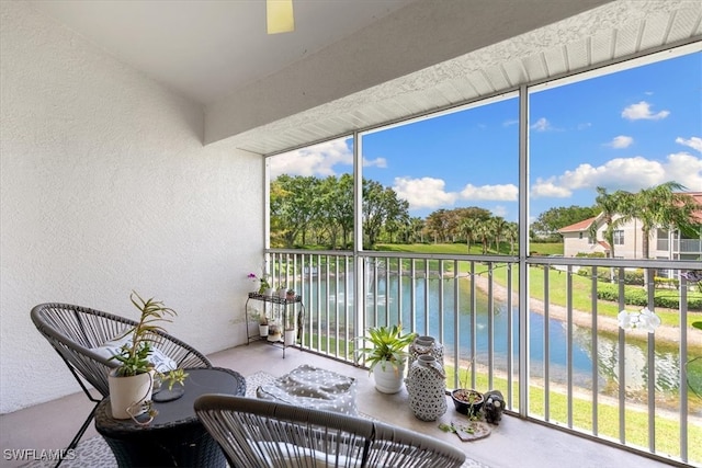 sunroom with a water view