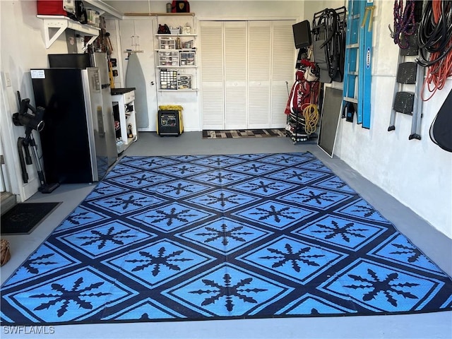 garage with freestanding refrigerator