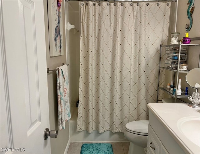 full bathroom with tile patterned flooring, vanity, shower / bath combo, and toilet