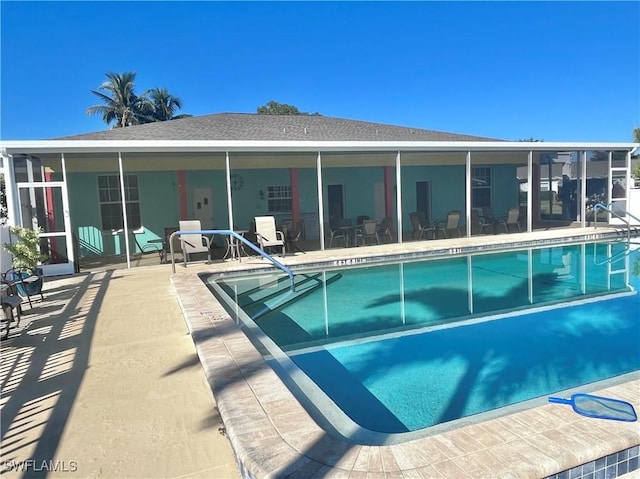 pool with a patio