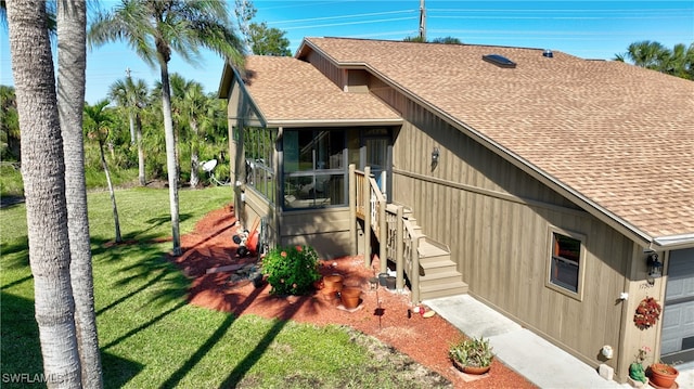 view of home's exterior featuring a lawn