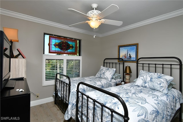 bedroom with ceiling fan, crown molding, and light hardwood / wood-style floors