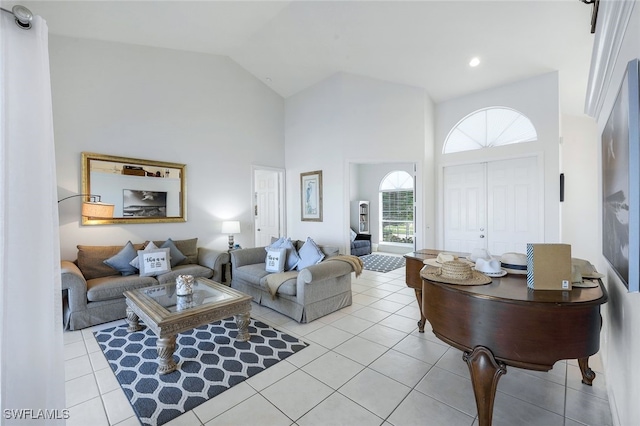 tiled living room featuring high vaulted ceiling