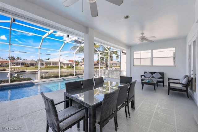 exterior space with a pool and ceiling fan