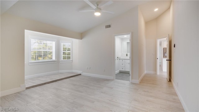 930 SW 28th St, Cape Coral, FL 33914 - unfurnished room featuring a ceiling fan, light wood-style flooring, baseboards, and high vaulted ceiling