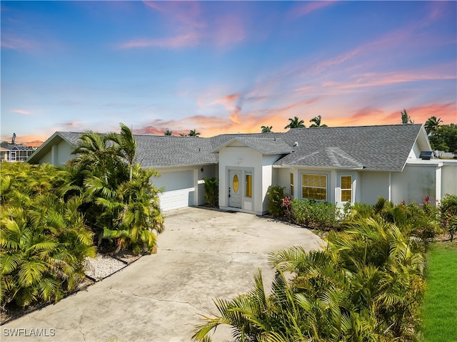 view of front of property featuring a garage