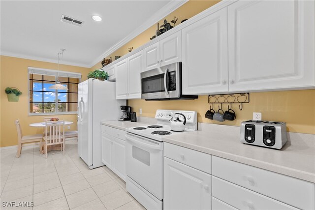 kitchen featuring ornamental molding, white cabinetry, light tile patterned floors, hanging light fixtures, and white appliances