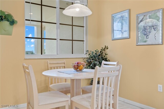 view of tiled dining area