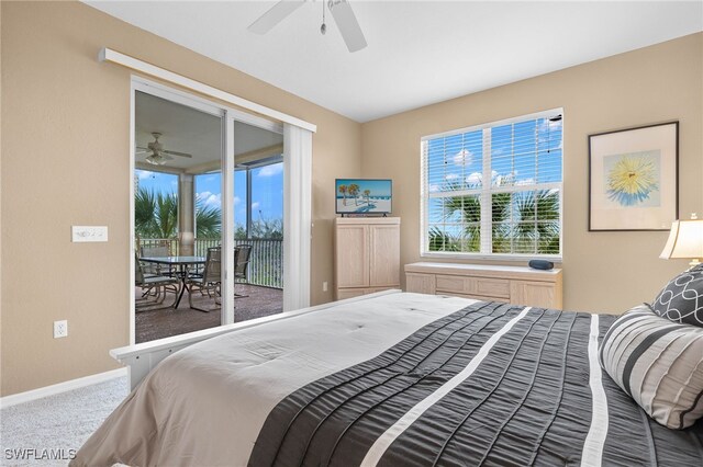 bedroom with ceiling fan, carpet flooring, and access to outside