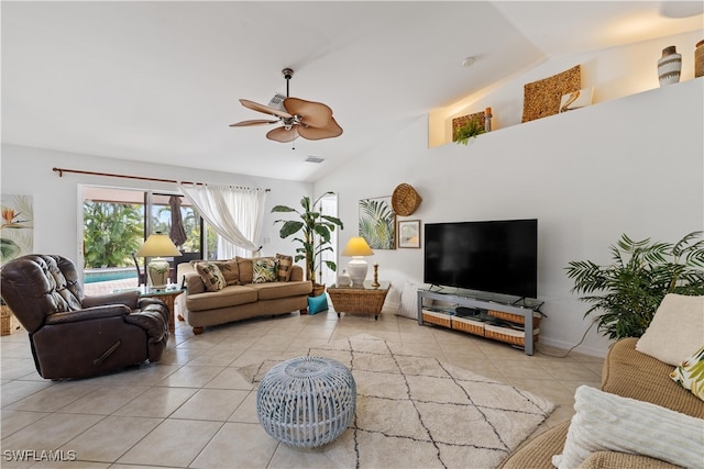 living room featuring light tile patterned floors, high vaulted ceiling, and ceiling fan