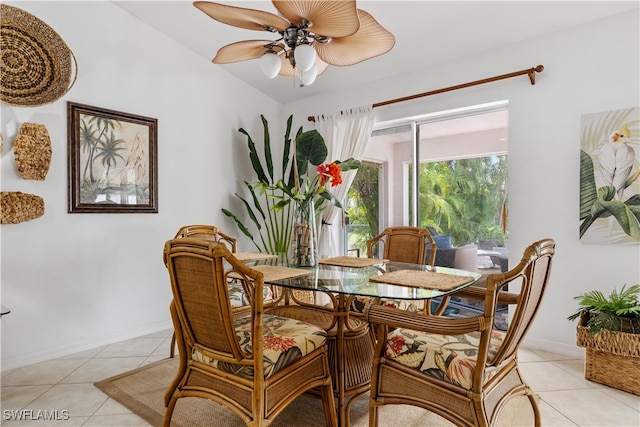 dining area with ceiling fan and light tile patterned floors