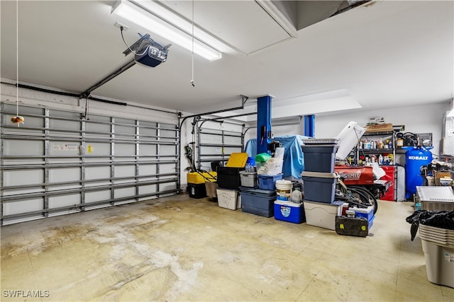 garage featuring a garage door opener