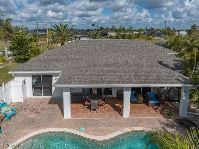 rear view of property with a patio area