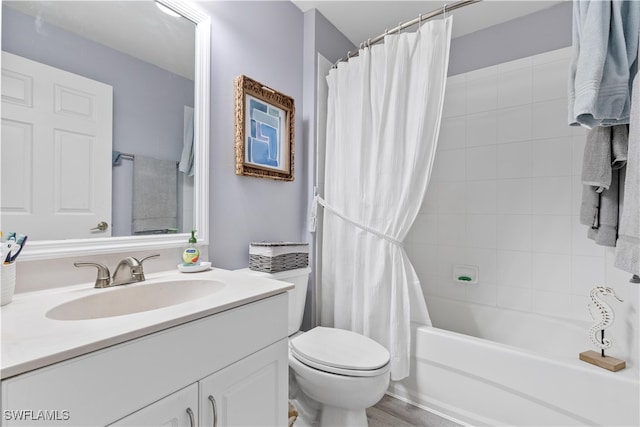 full bathroom with vanity, hardwood / wood-style floors, shower / bathtub combination with curtain, and toilet