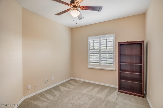 22890 Forest Ridge Dr, Estero, FL 33928 - carpeted spare room with a ceiling fan and baseboards