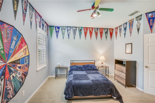 carpeted bedroom featuring ceiling fan