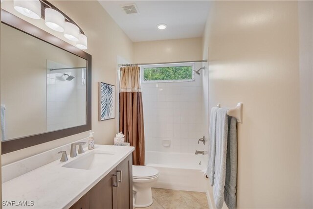 22890 Forest Ridge Dr, Estero, FL 33928 - full bathroom featuring toilet, vanity, shower / bath combination with curtain, and tile patterned floors