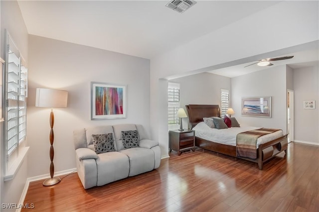 22890 Forest Ridge Dr, Estero, FL 33928 - bedroom with wood finished floors and baseboards