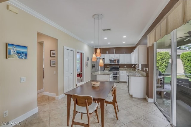 22890 Forest Ridge Dr, Estero, FL 33928 - dining area with ornamental molding, baseboards, light tile patterned flooring, and recessed lighting