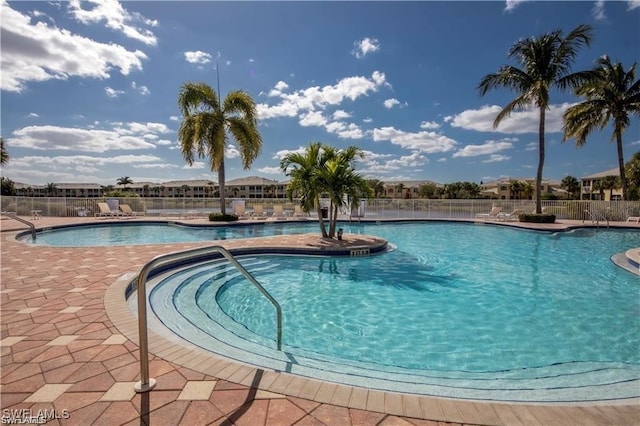 view of swimming pool featuring a patio