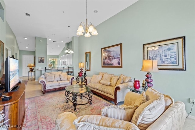 living area featuring an inviting chandelier, recessed lighting, high vaulted ceiling, and visible vents