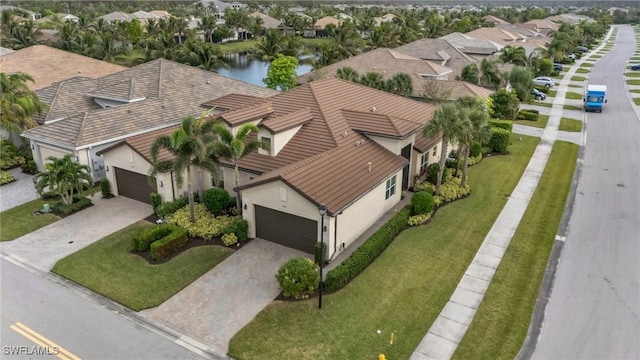 aerial view with a water view and a residential view