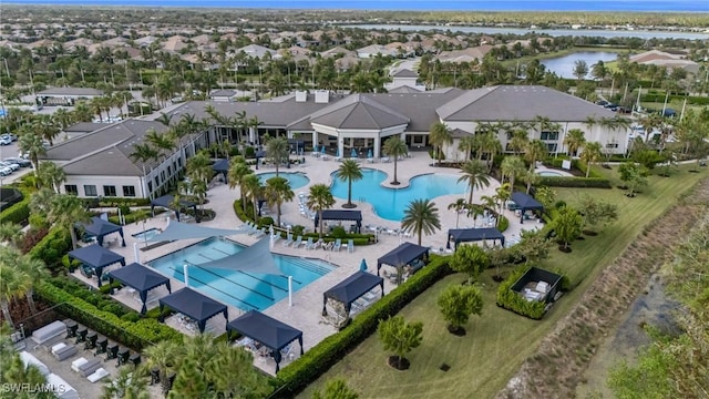 aerial view featuring a water view and a residential view