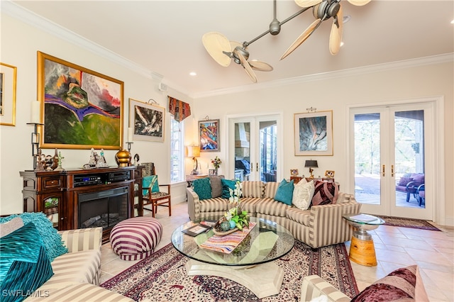 tiled living room with a wealth of natural light, french doors, and crown molding